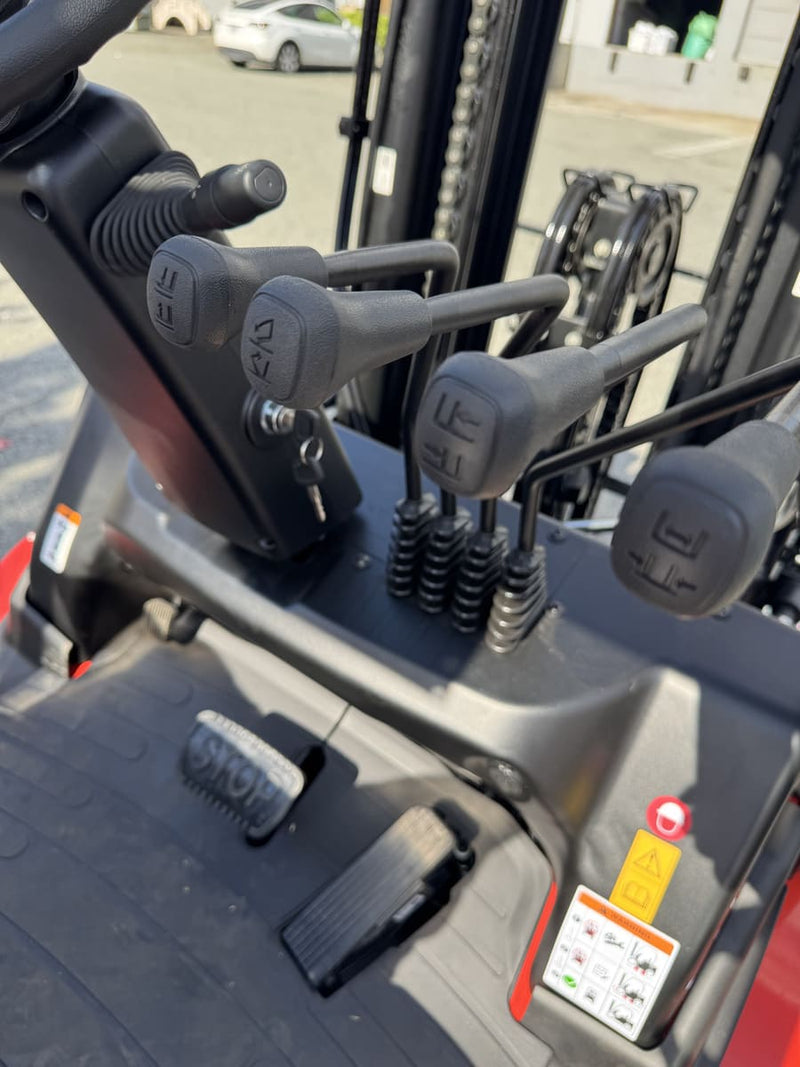 Raelon EFL30 electric forklift hydraulic control levers close-up