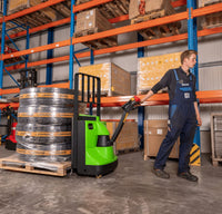 Raelon EPT25-WA electric pallet jack moving pallet loads in a warehouse