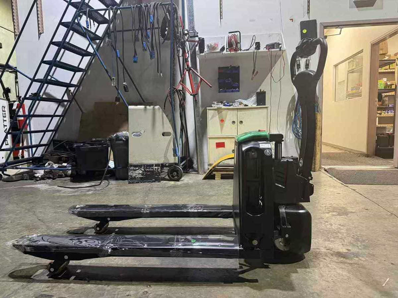 Raelon F4-202 4,400 lbs electric pallet jack in the warehouse – side view