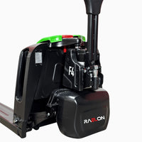 Raelon F4 electric pallet jack drive unit close-up showing F4 model badge, green battery cover, and Raelon logo — real product photo