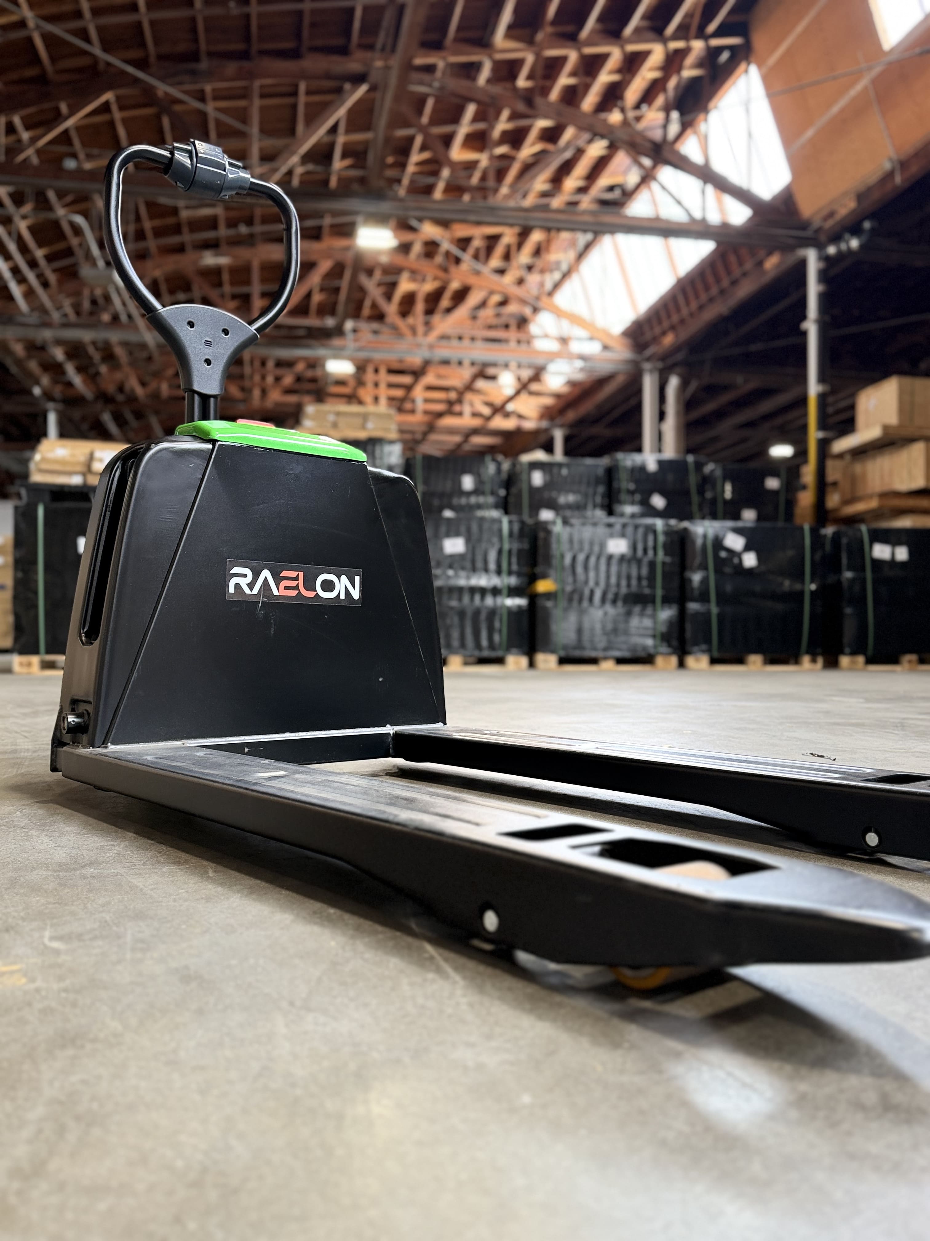 Raelon F4 forks on warehouse floor