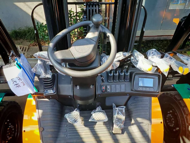 Raelon FL45T 9,900 lbs LPG forklift operator station with steering wheel, hydraulic levers and digital display